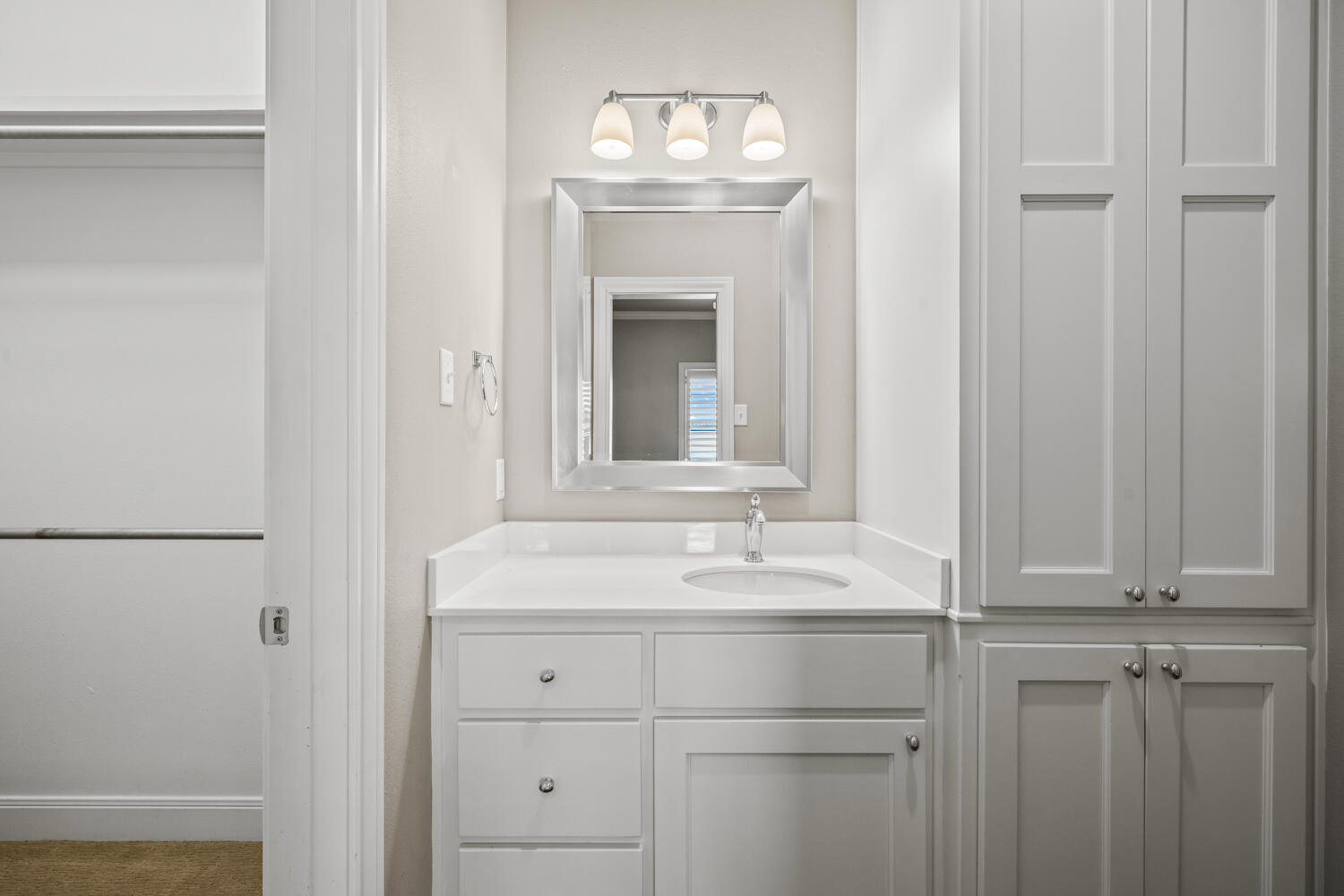 1405 11th Place Shallowater, TX 79363 - Photo 45 of 81 a bathroom with a sink and a mirror