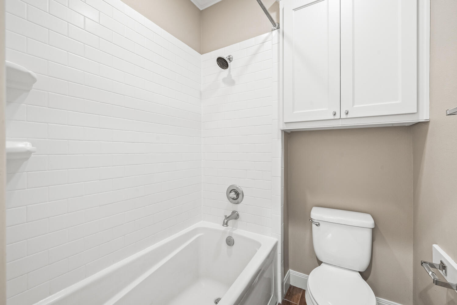 1405 11th Place Shallowater, TX 79363 - Photo 48 of 81 a bathroom with a toilet and a bathtub