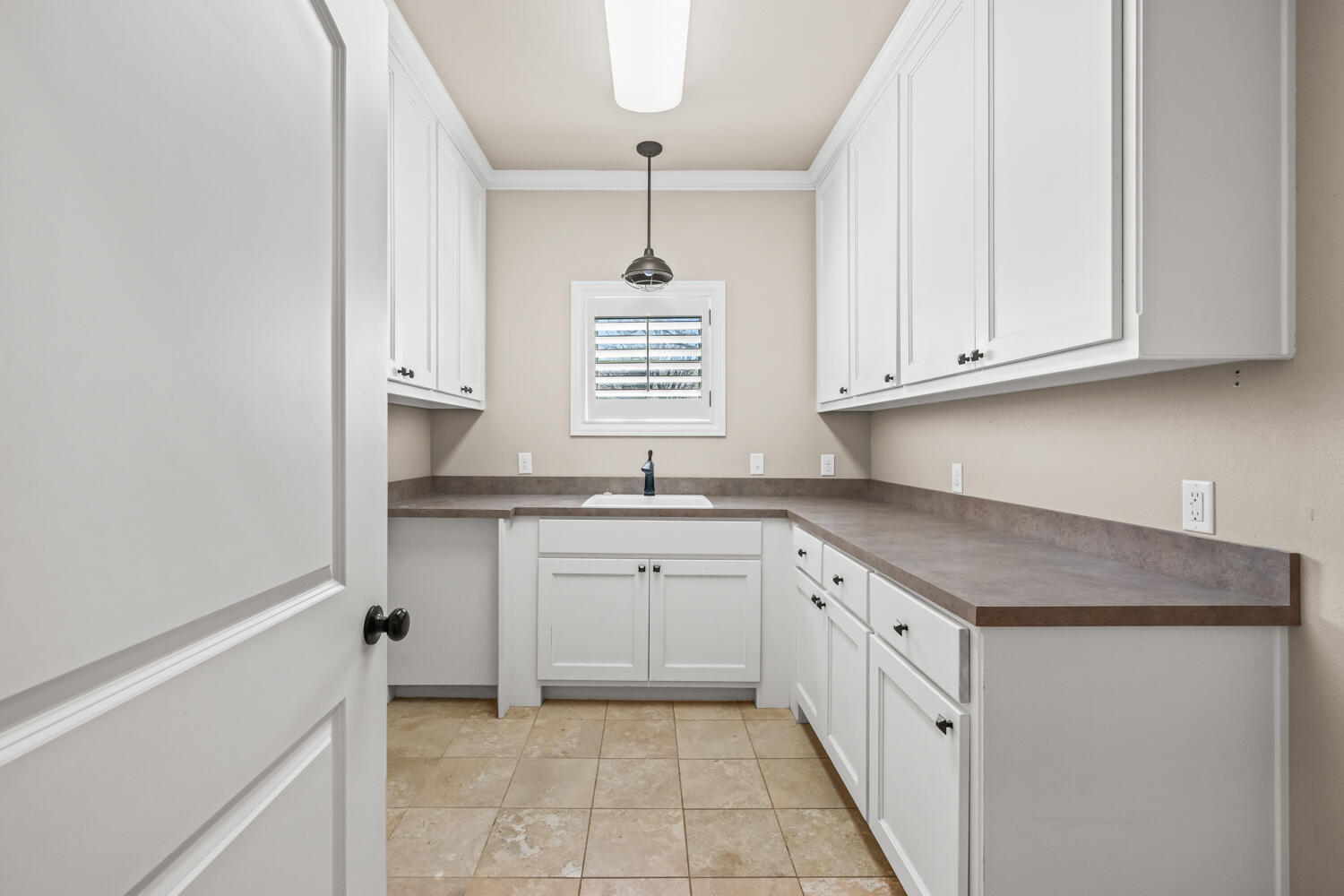 1405 11th Place Shallowater, TX 79363 - Photo 60 of 81 a kitchen with granite countertop white cabinets and white appliances