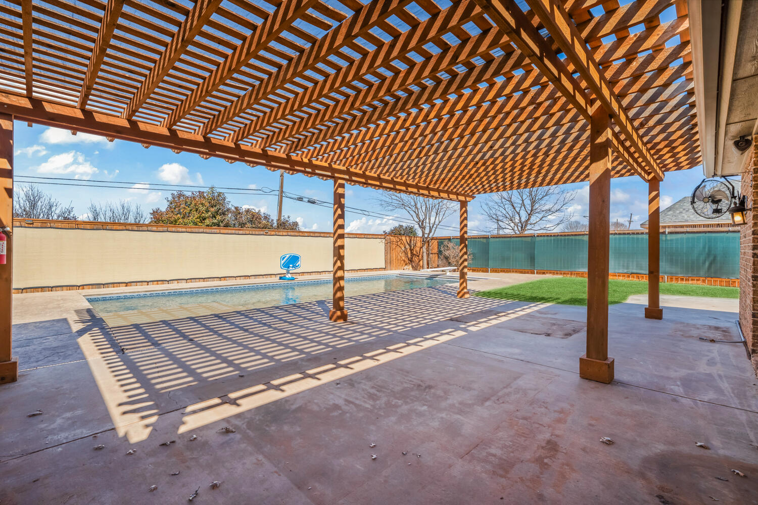1405 11th Place Shallowater, TX 79363 - Photo 73 of 81 a view of a backyard with wooden floor