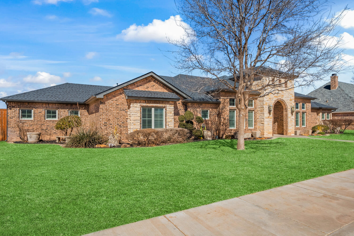 1405 11th Place Shallowater, TX 79363 - Photo 81 of 81 a front view of a house with a garden