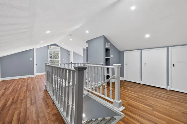 a view of entryway with wooden floor