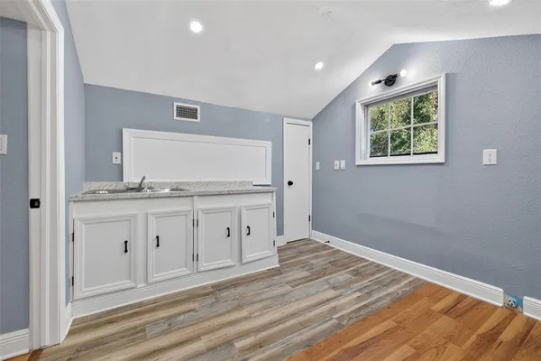 a view of kitchen and utility room