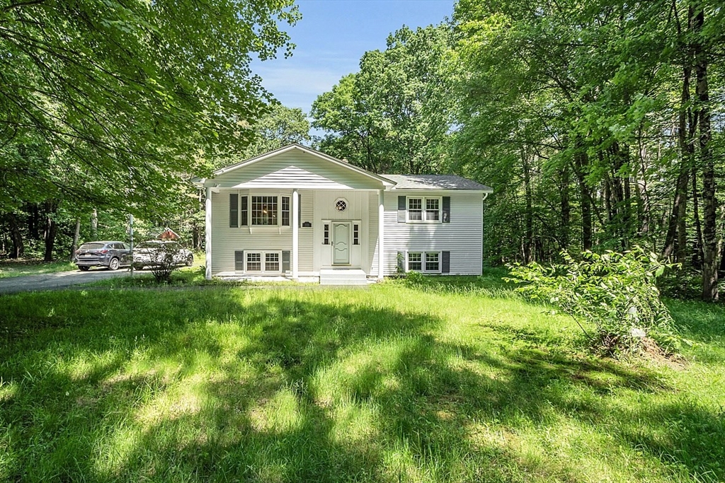 113 Townsend Road Shirley, MA 01464 - Photo 1 of 30 a view of a house with yard and garden