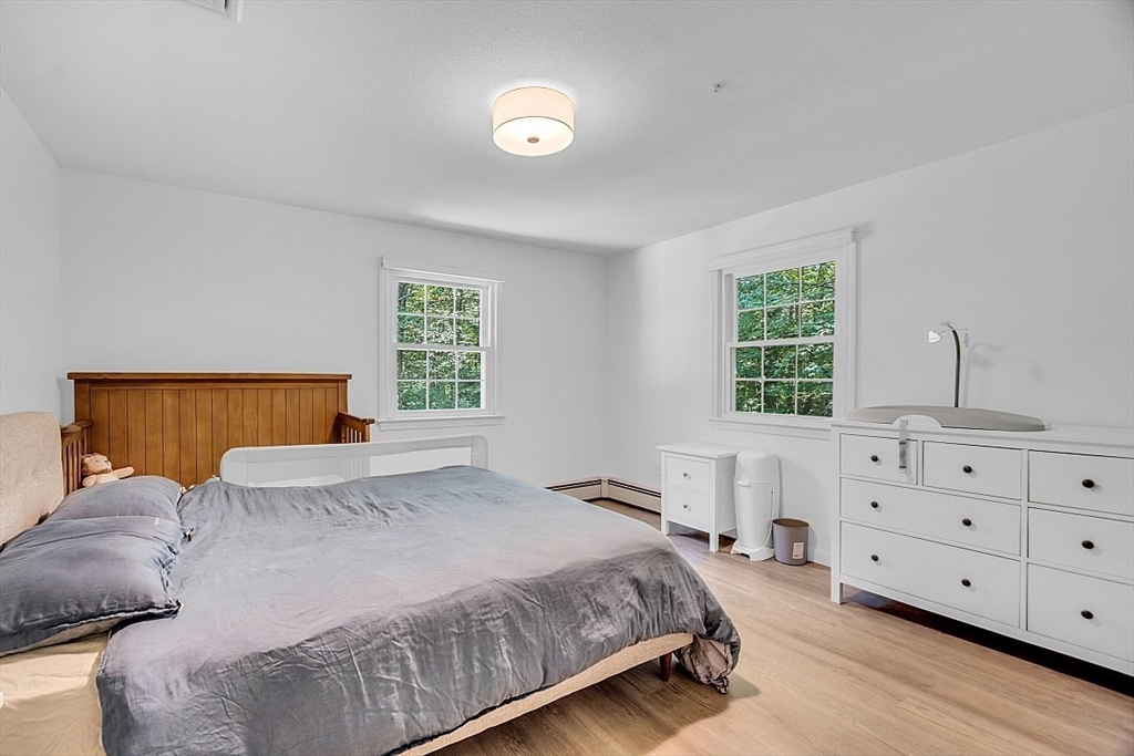 113 Townsend Road Shirley, MA 01464 - Photo 17 of 30 a bedroom with a bed and window