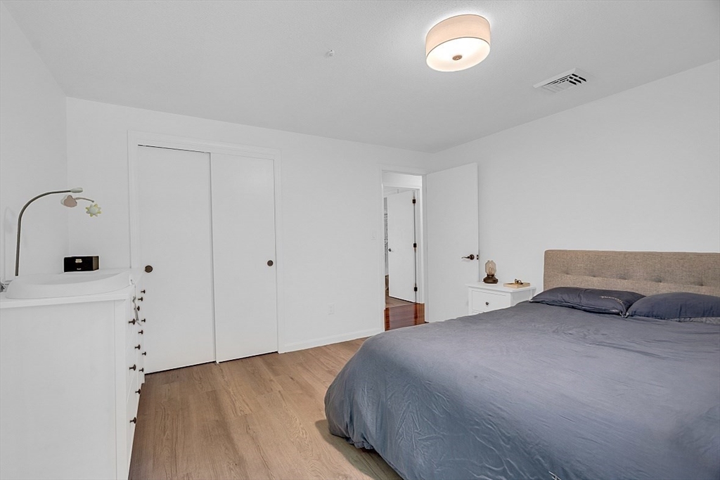 113 Townsend Road Shirley, MA 01464 - Photo 18 of 30 a bedroom with a bed and a window