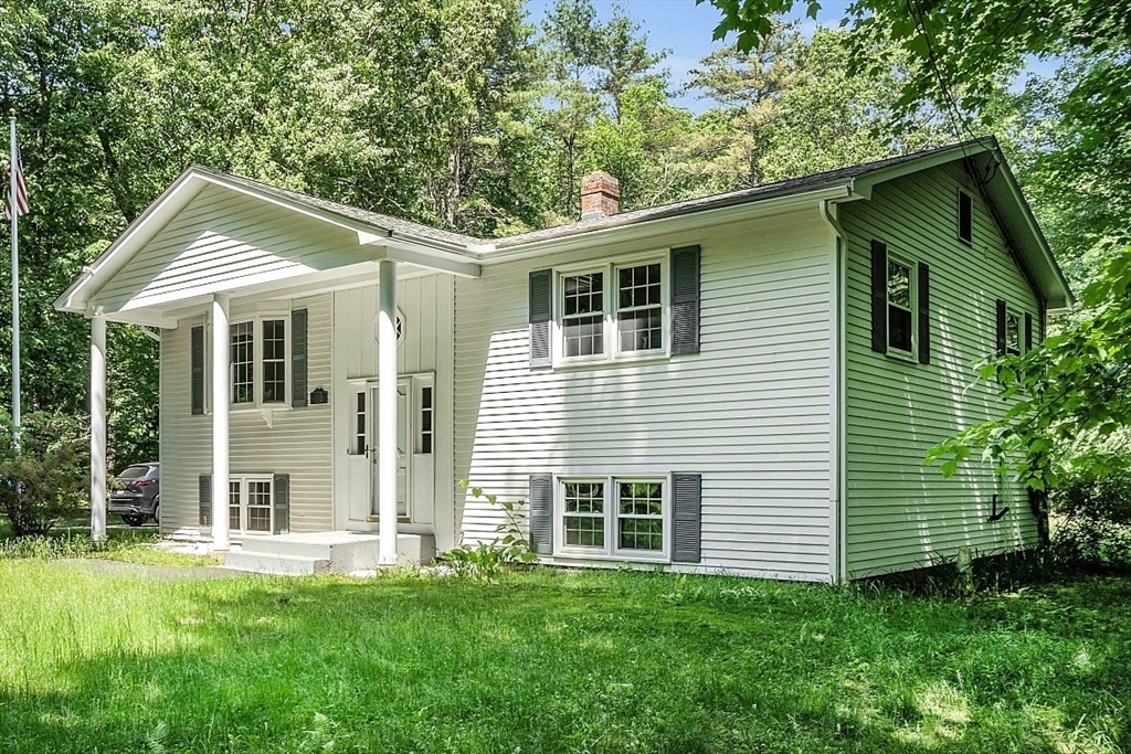 113 Townsend Road Shirley, MA 01464 - Photo 2 of 30 a view of a house with a yard