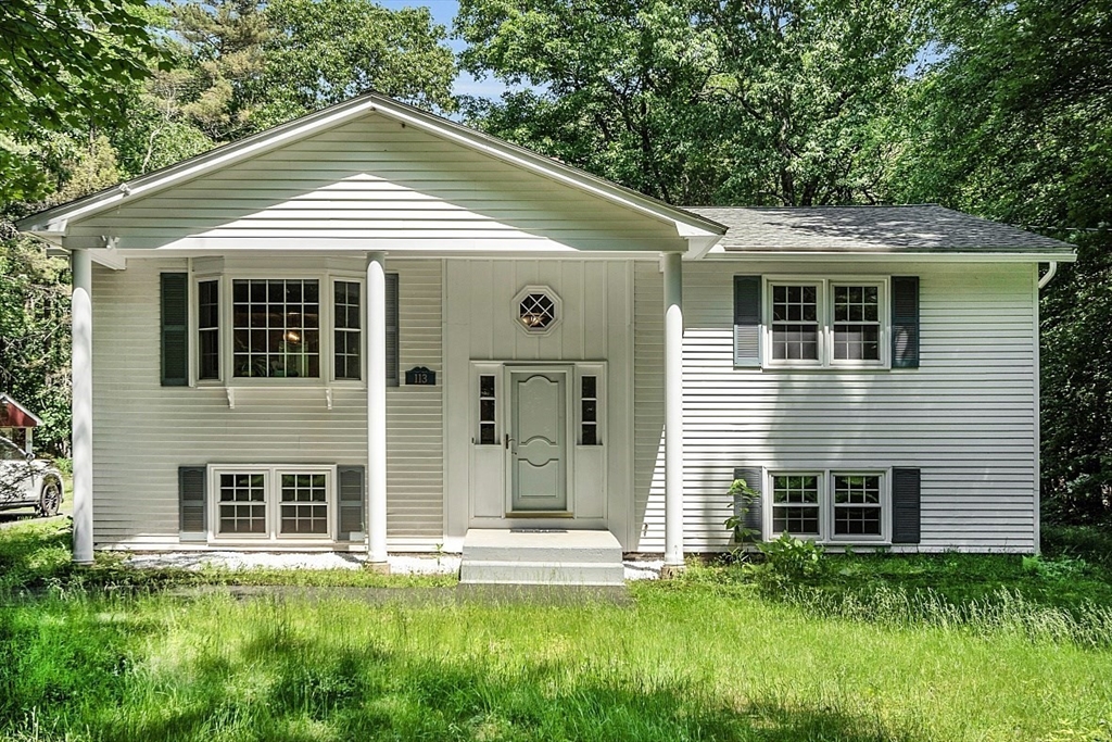 113 Townsend Road Shirley, MA 01464 - Photo 3 of 30 a front view of a house with a yard