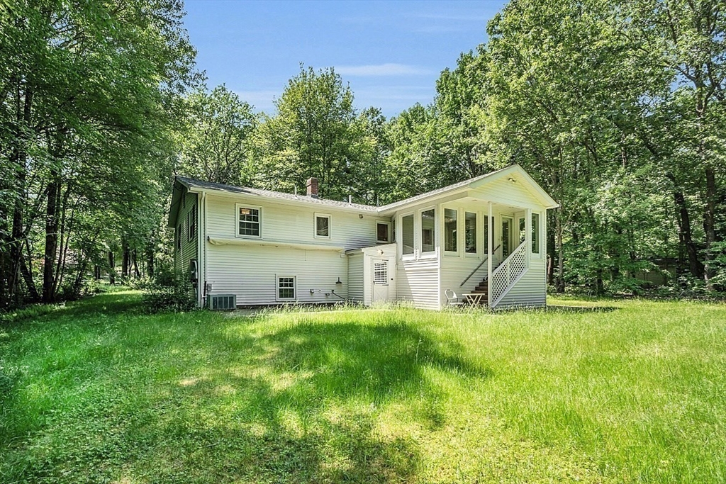 113 Townsend Road Shirley, MA 01464 - Photo 4 of 30 a front view of house with yard and green space