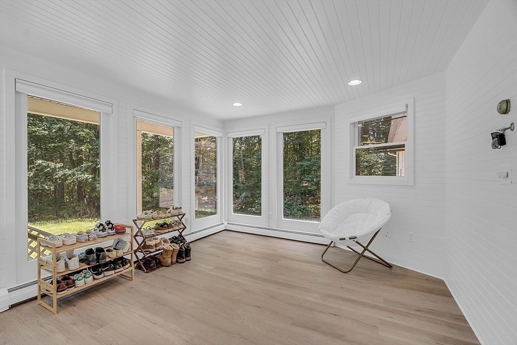113 Townsend Road Shirley, MA 01464 - Photo 7 of 30 a view of a room with gym equipment and floor to ceiling window