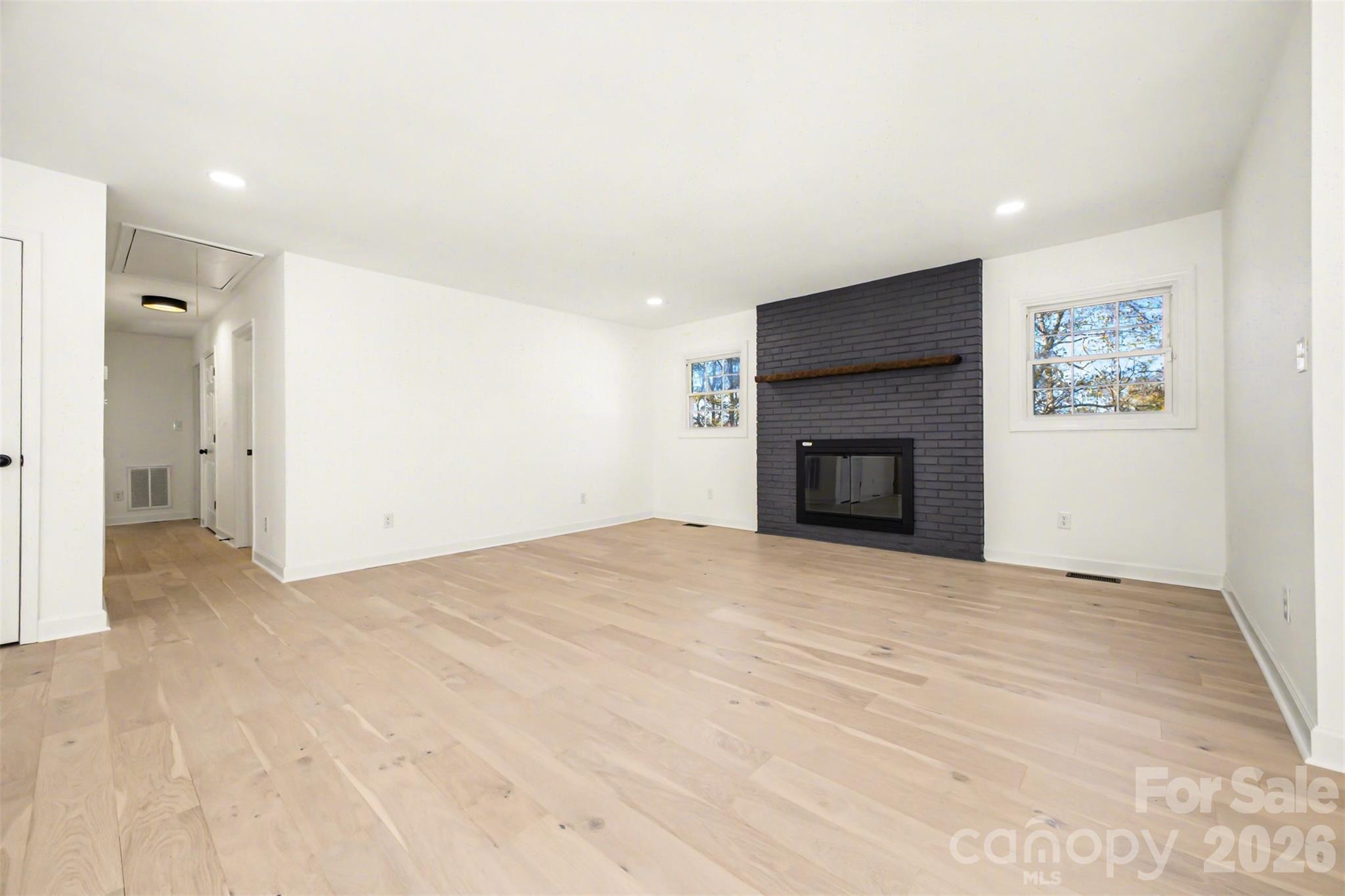 211 Ole Simpson Place Catawba, SC 29704 - Photo 11 of 38 a view of empty room with a fireplace