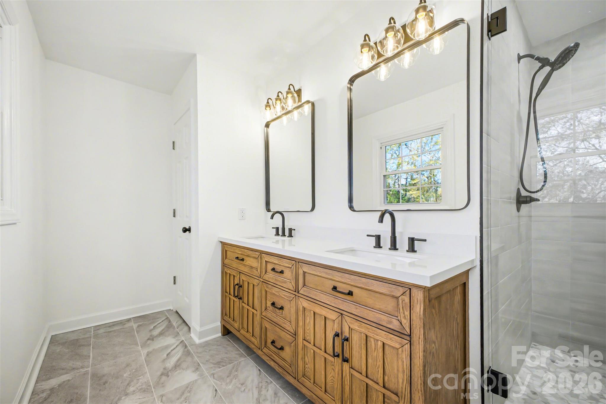 211 Ole Simpson Place Catawba, SC 29704 - Photo 22 of 38 a bathroom with a double vanity sink mirror and shower