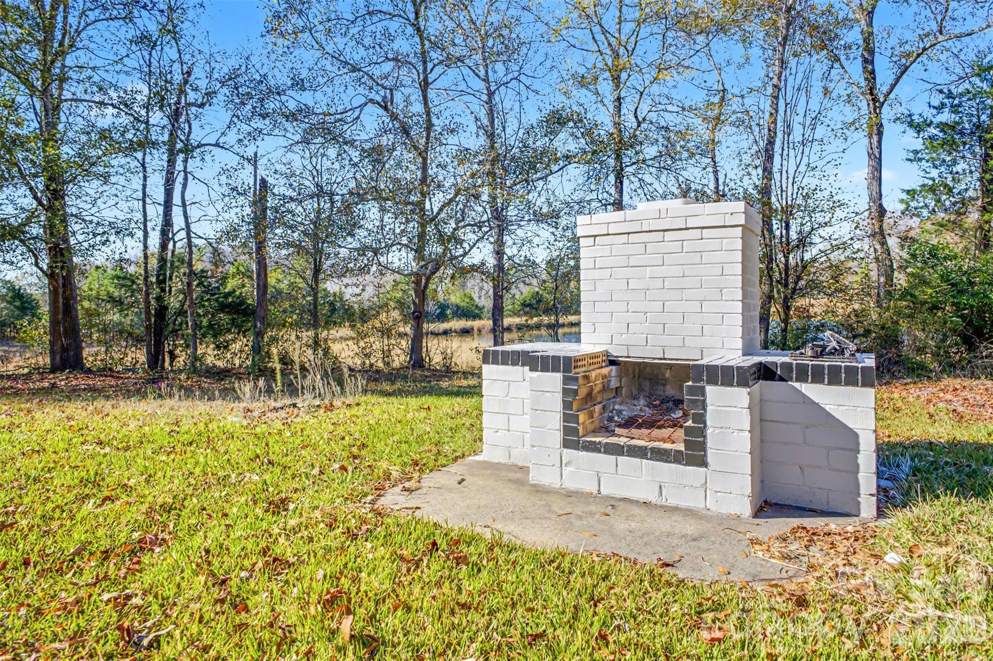 211 Ole Simpson Place Catawba, SC 29704 - Photo 35 of 38 a view of a backyard with sitting area