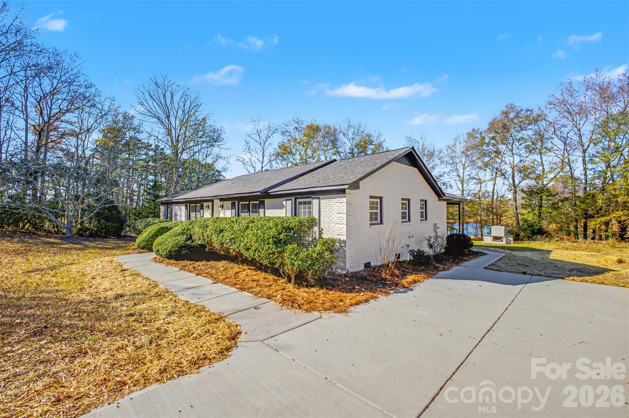 211 Ole Simpson Place Catawba, SC 29704 - Photo 38 of 38 a front view of a house with a yard and trees