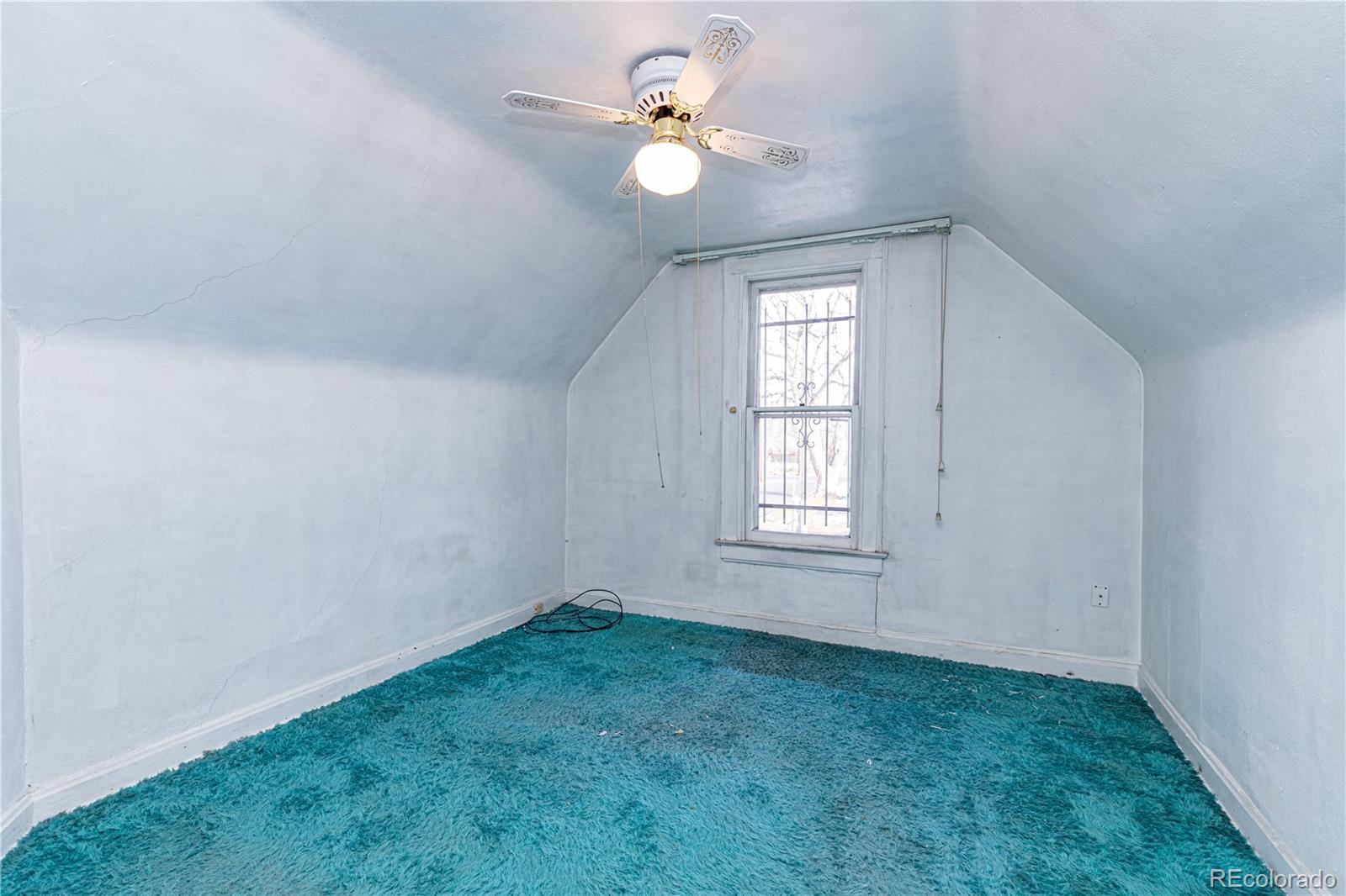 4494 Meade Street Denver, CO 80211 - Photo 16 of 24 wooden floor in an empty room with a window