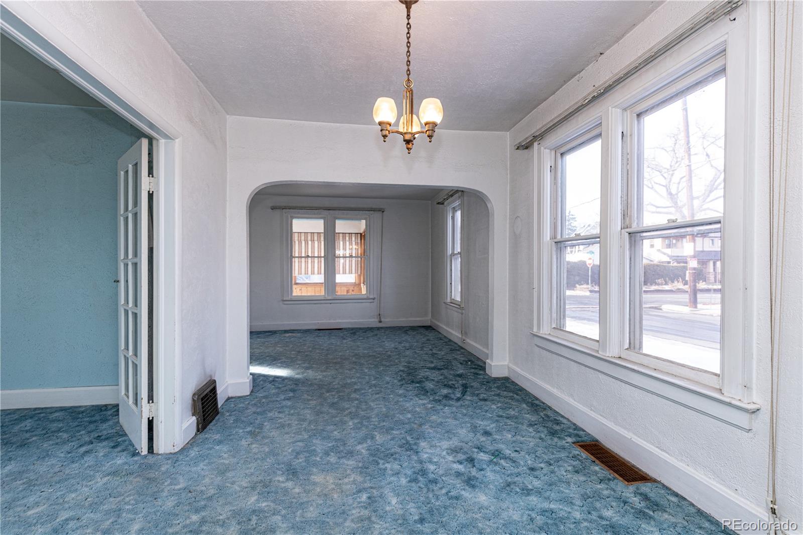 4494 Meade Street Denver, CO 80211 - Photo 6 of 24 a view of a windows and chandelier in a room