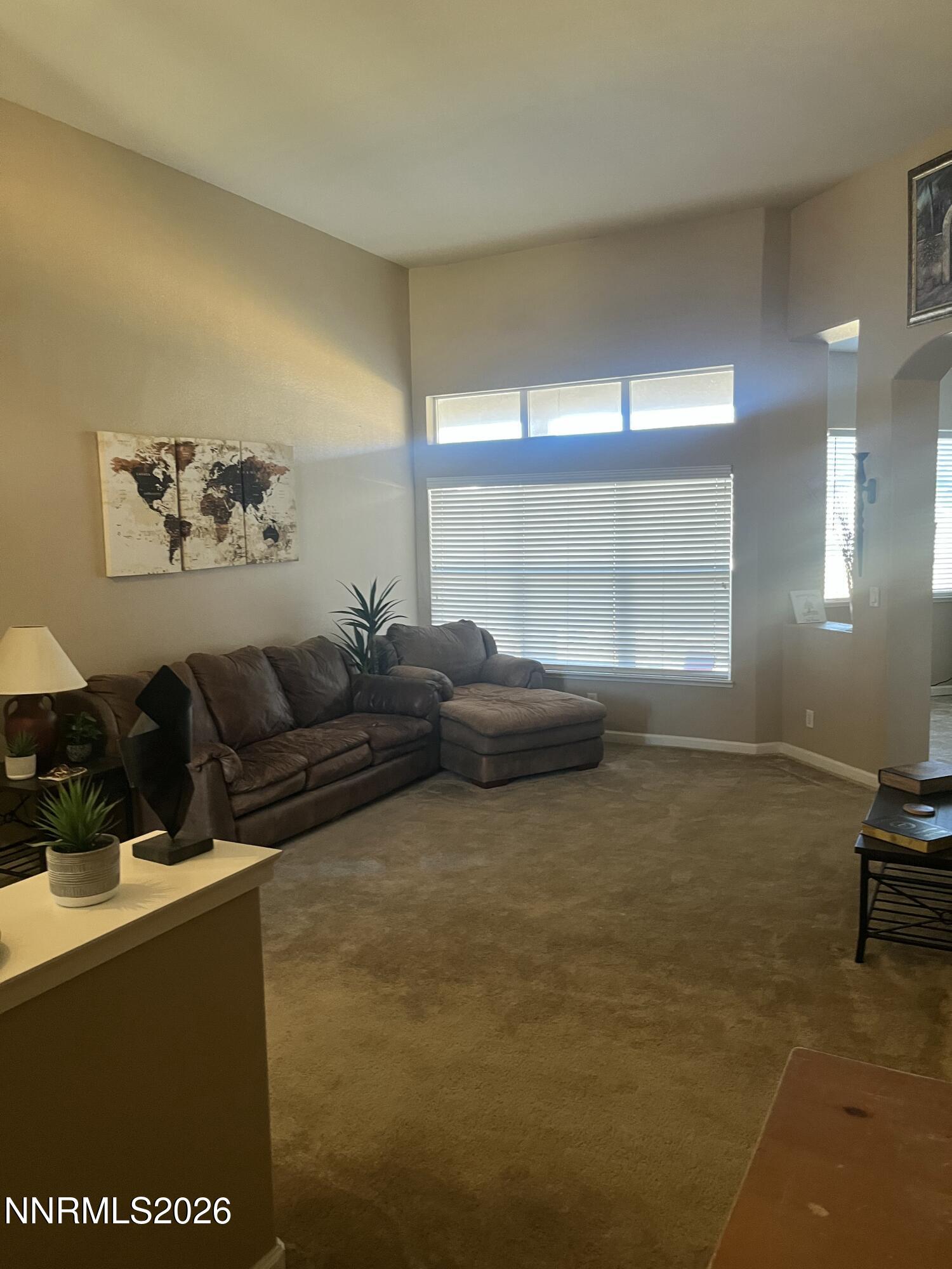 1895 Vintner Court Reno, NV 89519 - Photo 11 of 30 a living room with furniture and a window