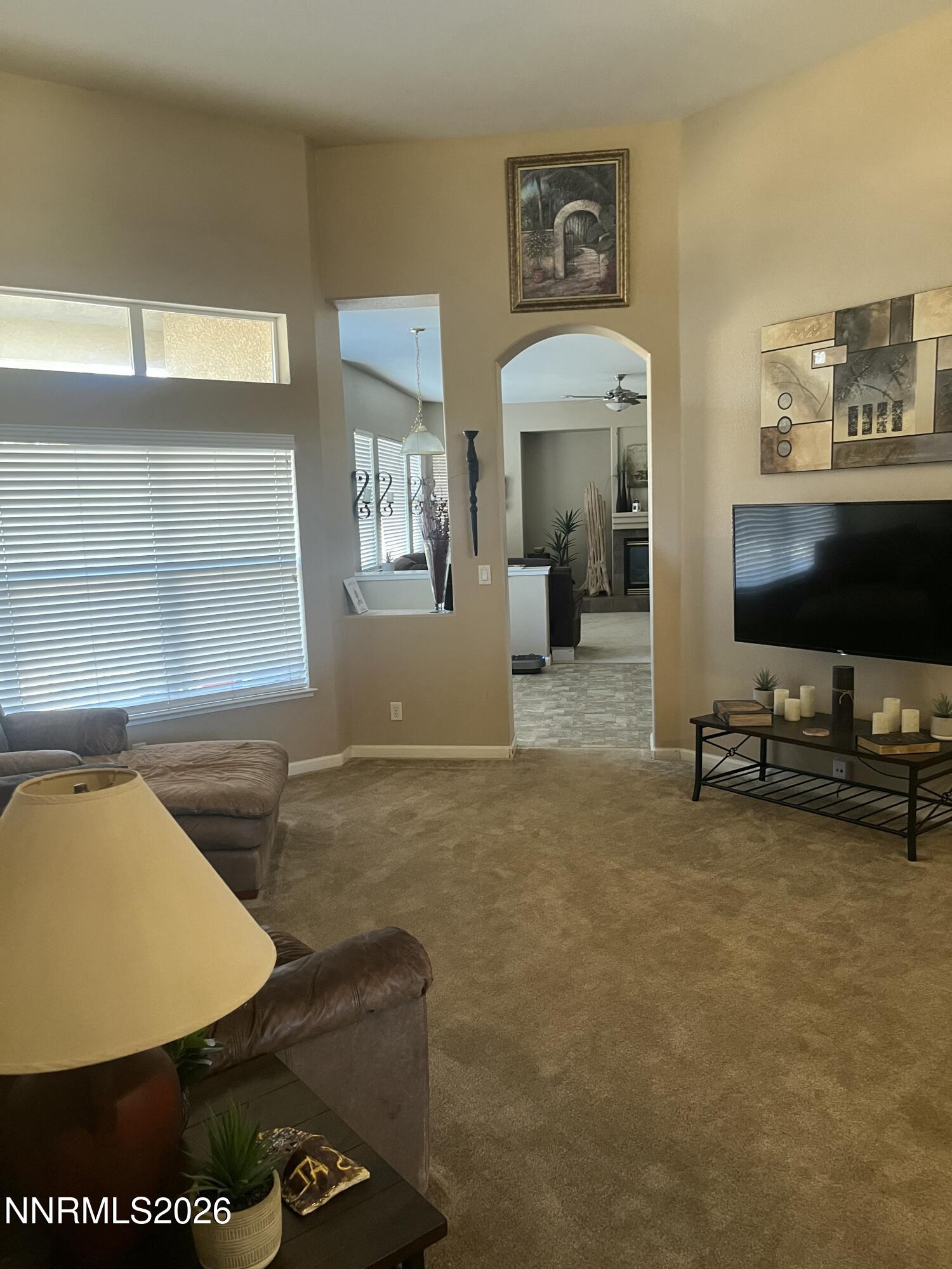 1895 Vintner Court Reno, NV 89519 - Photo 12 of 30 a view of a livingroom with workspace and a window