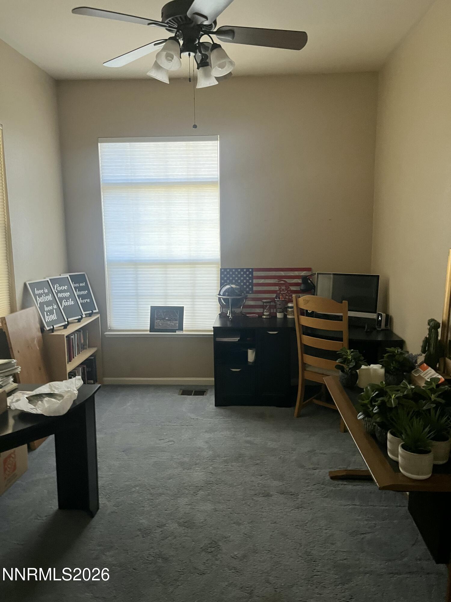 1895 Vintner Court Reno, NV 89519 - Photo 20 of 30 a living room with furniture and a window