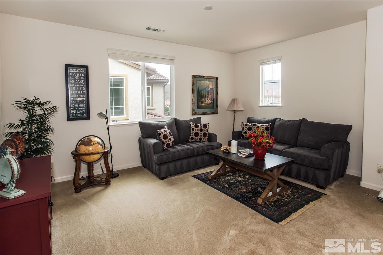 2025 Horse Prairie Road Reno, NV 89521 - Photo 17 of 25 a living room with furniture a couch and potted plants