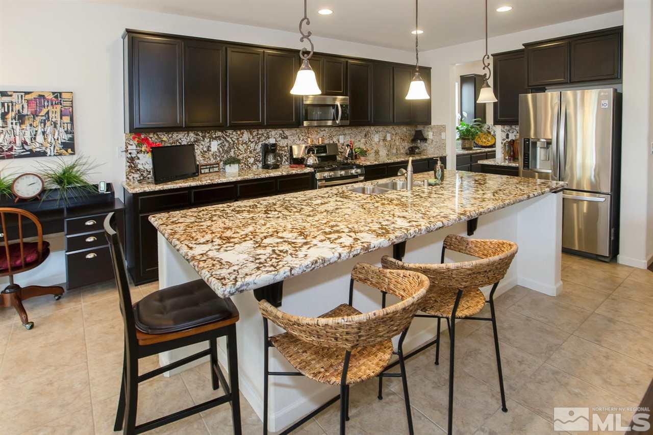 2025 Horse Prairie Road Reno, NV 89521 - Photo 8 of 25 a kitchen with a table and chairs in it