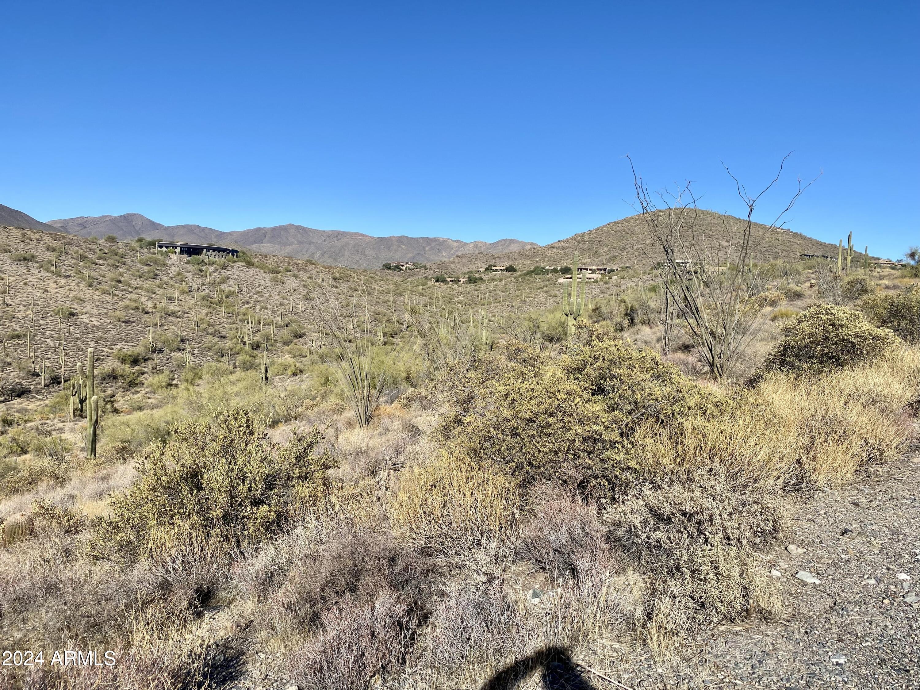8828 East Red Lawrence Drive, Unit 33 Scottsdale, AZ 85262 - Photo 4 of 9 a view of a large mountain with a mountain in the background
