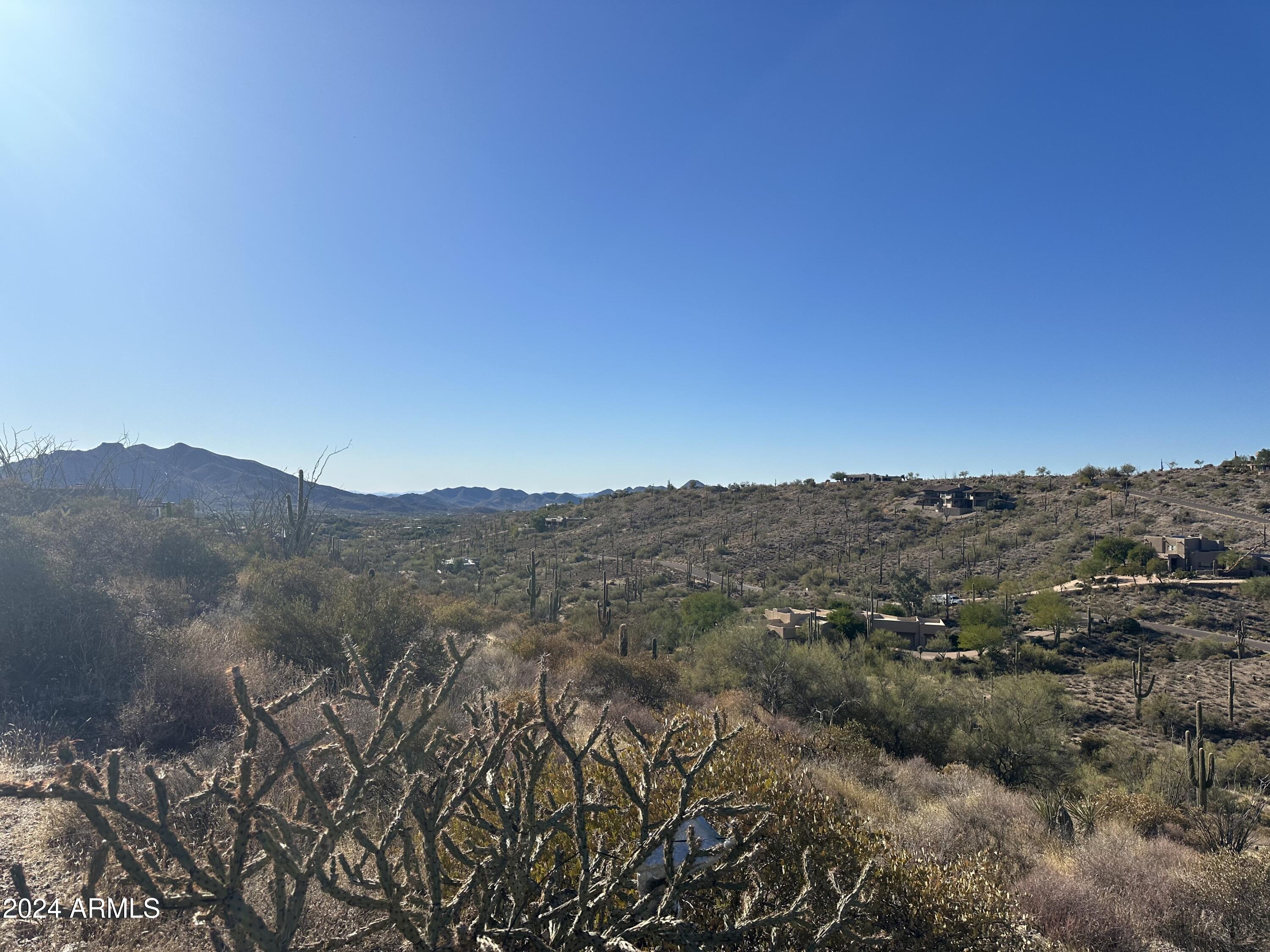 8828 East Red Lawrence Drive, Unit 33 Scottsdale, AZ 85262 - Photo 5 of 9 a view of a mountain range with lush green forest