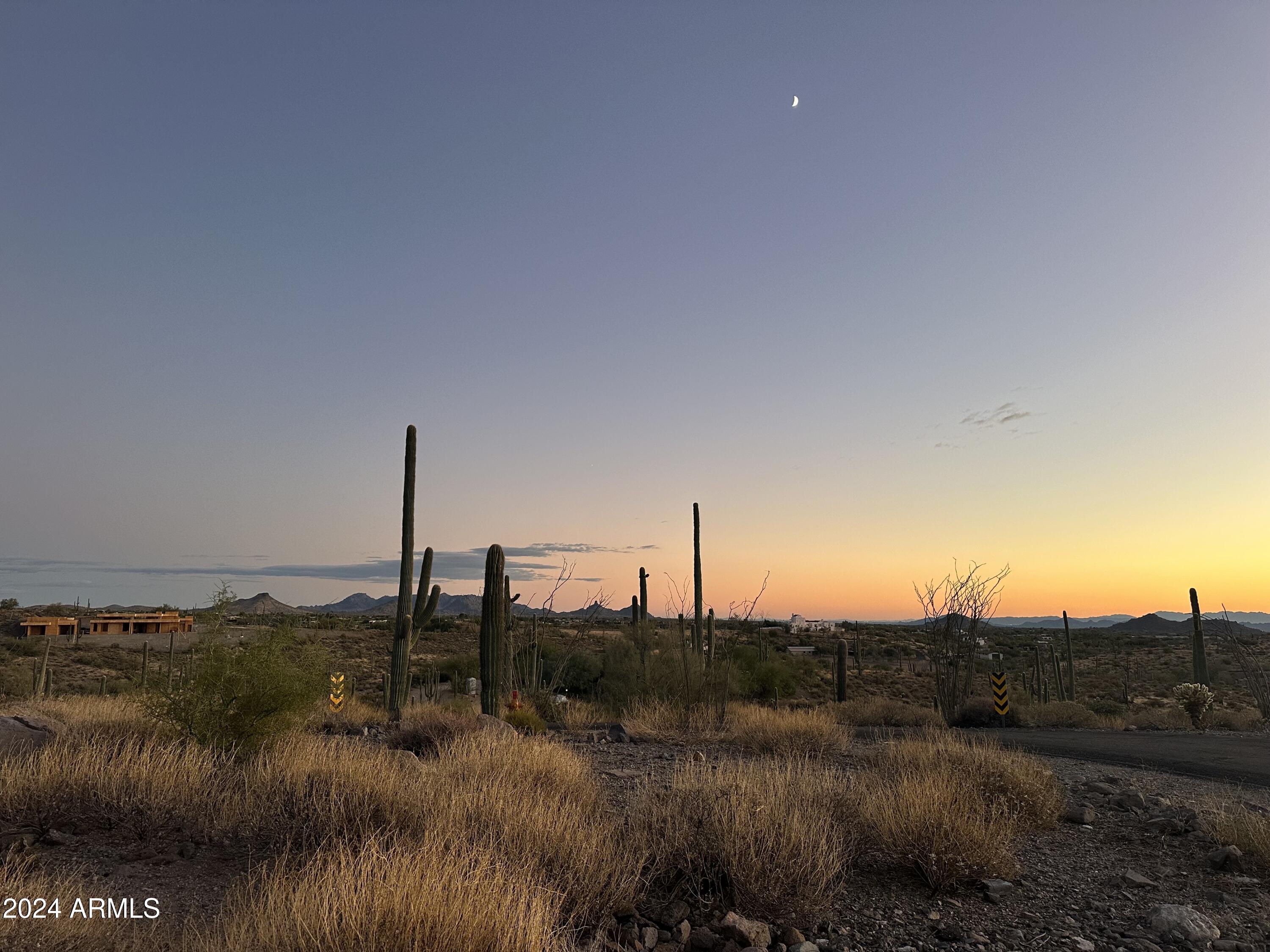 8828 East Red Lawrence Drive, Unit 33 Scottsdale, AZ 85262 - Photo 6 of 9 a view of a lake with a mountain