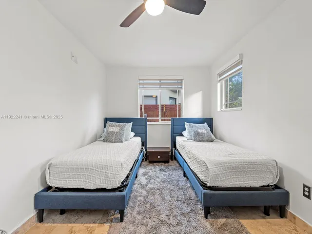 a view of a chairs and table in the patio