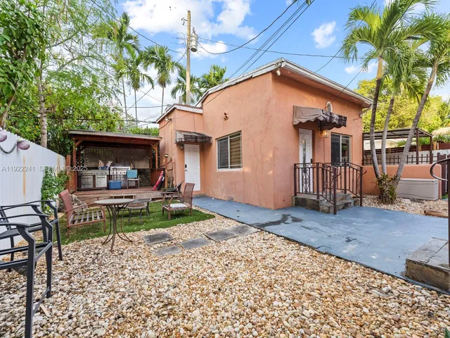 a view of a house with a patio