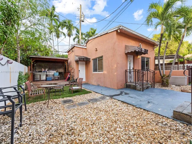 a view of a house with a patio