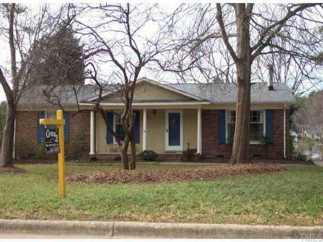 5312 Newhall Road Durham, NC 27713 - Photo 1 of 1 a front view of a house with garden
