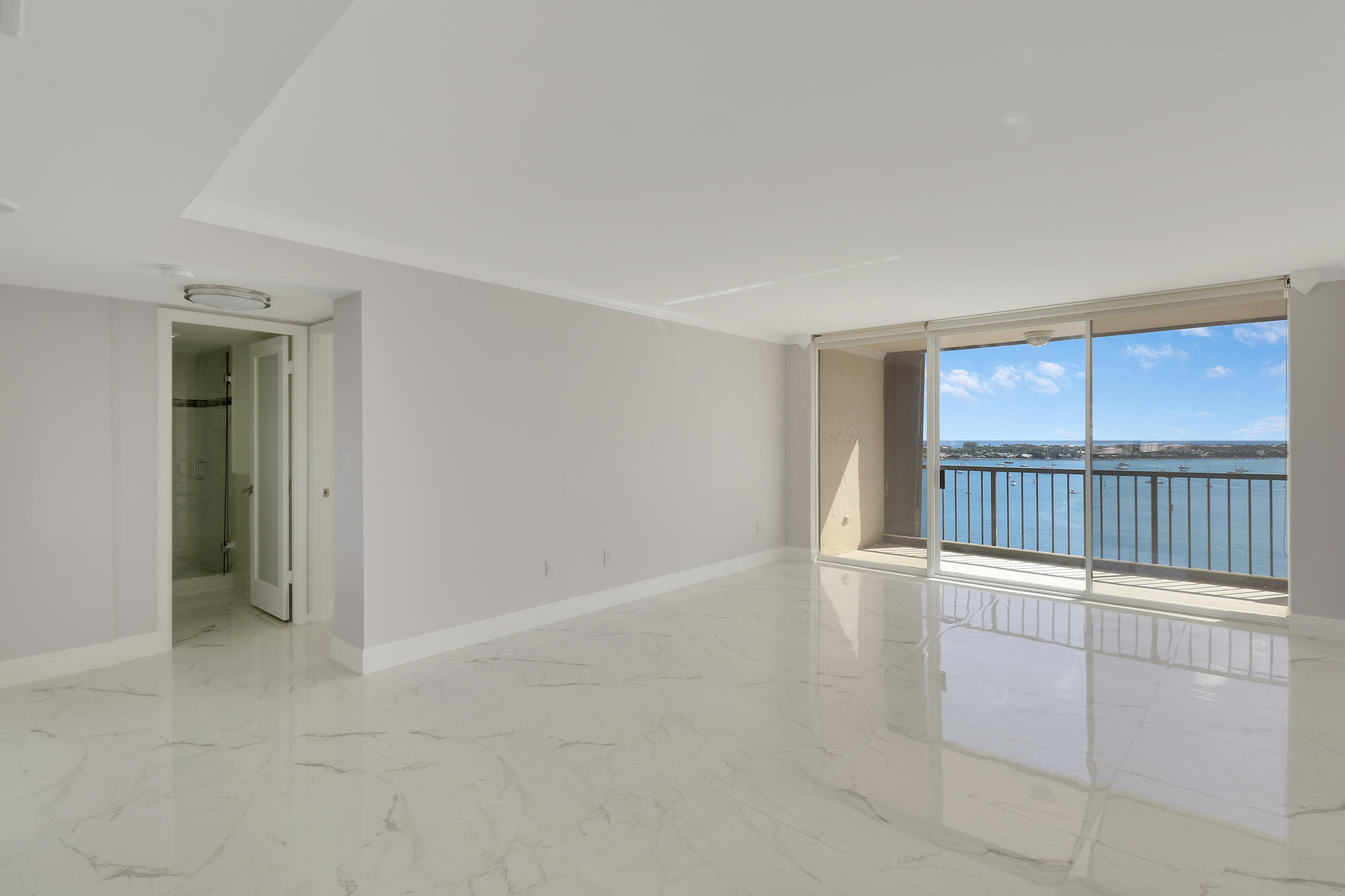 5200 North Flagler Drive, Unit 1404 West Palm Beach, FL 33407 - Photo 5 of 26 a view of an empty room with a window