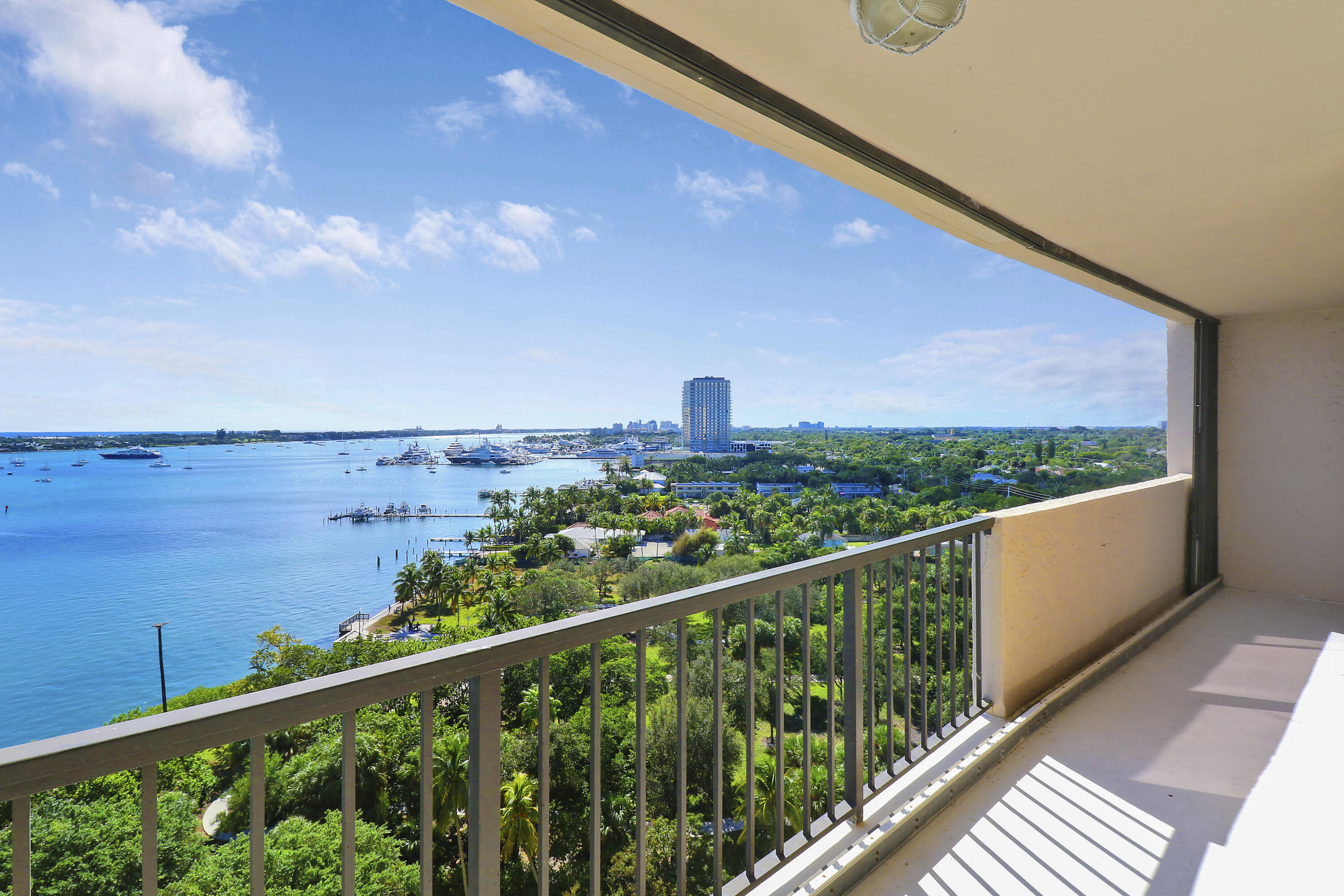 5200 North Flagler Drive, Unit 1404 West Palm Beach, FL 33407 - Photo 6 of 26 a view of a balcony with an outdoor space
