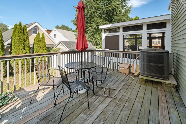 a view of balcony with furniture
