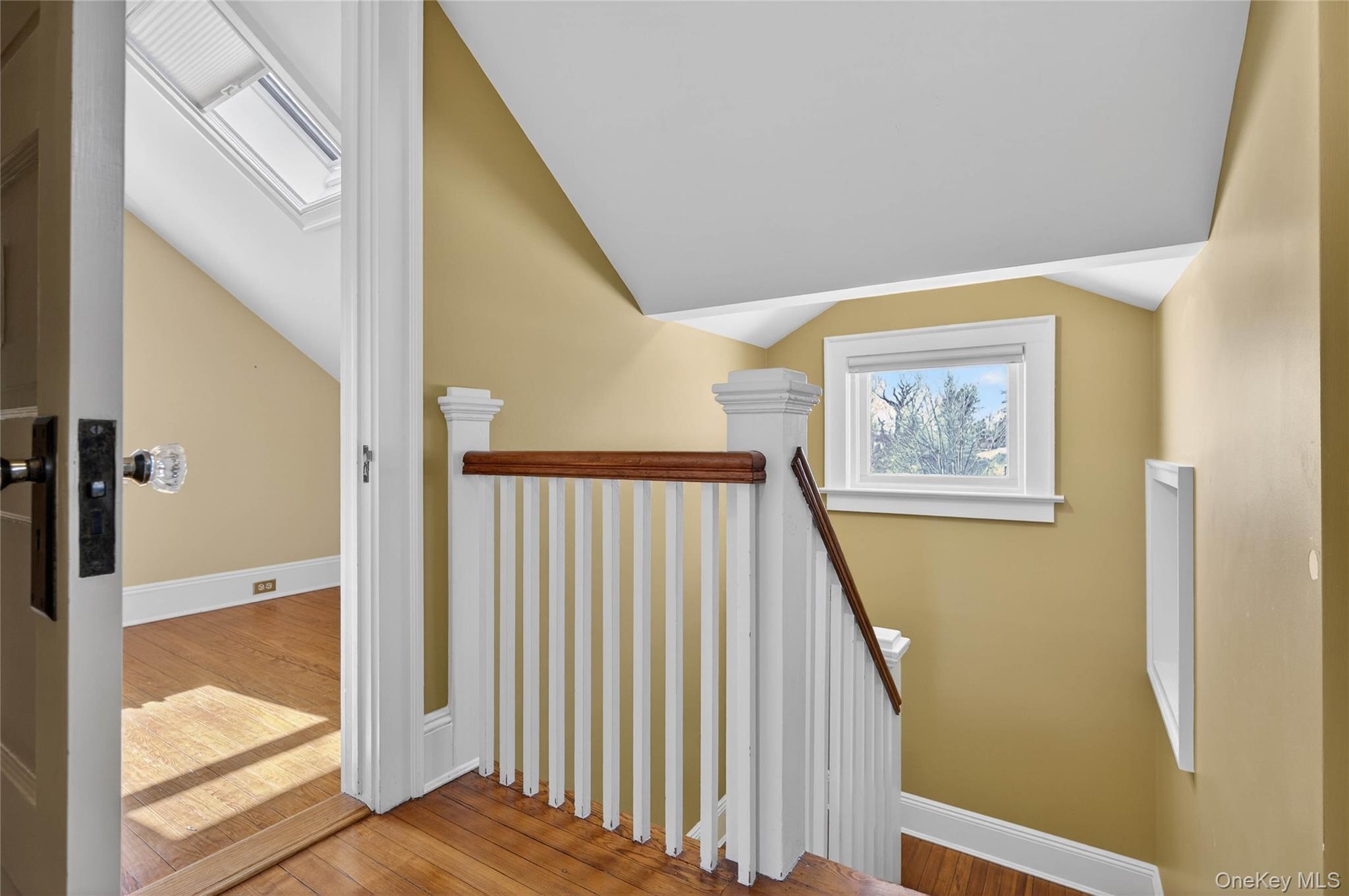 35 Birch Street Locust Valley, NY 11560 - Photo 19 of 27 a view of a hallway with wooden floor and entryway