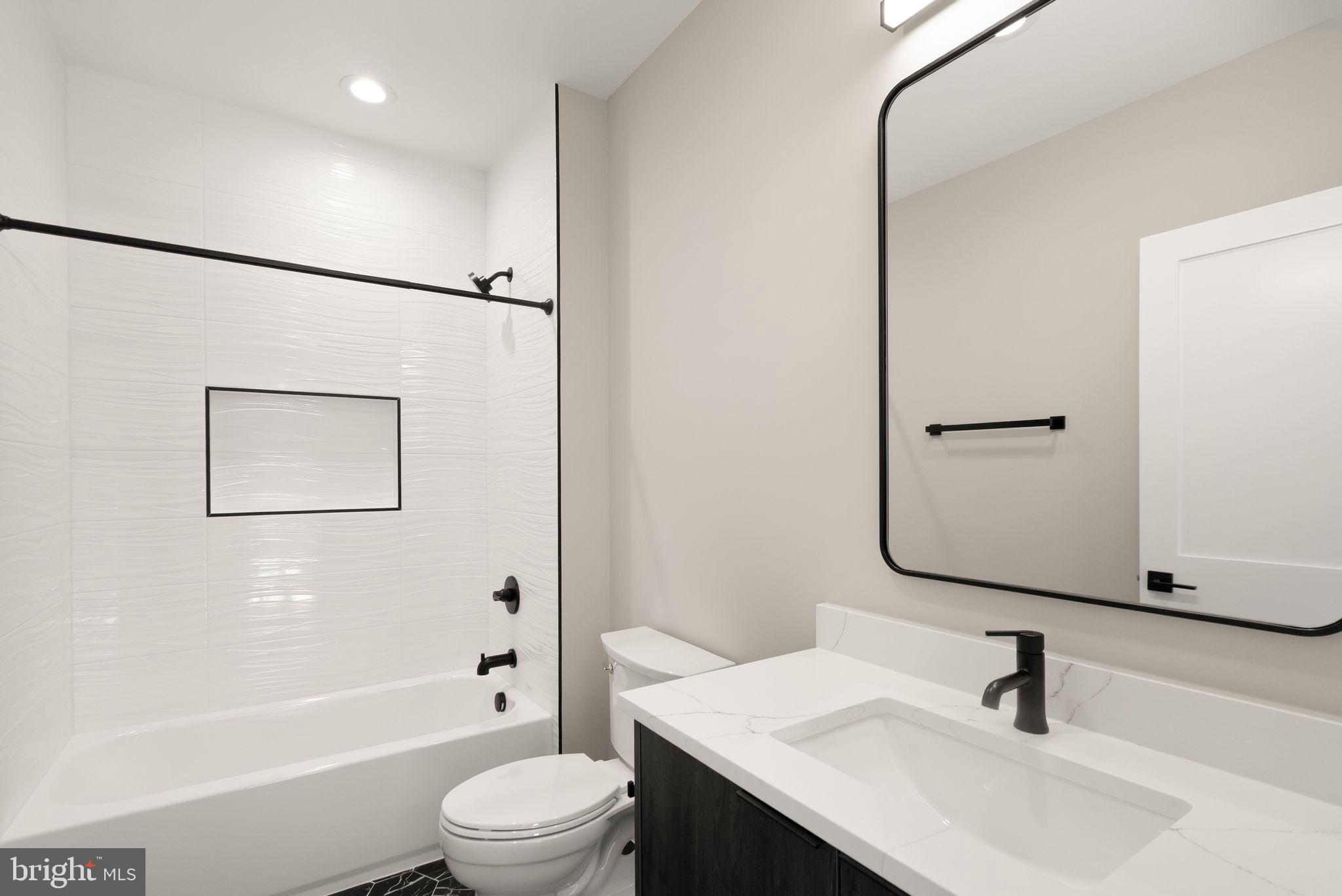 6329 Halsey Road McLean, VA 22101 - Photo 66 of 94 Sleek modern bathroom with elegant finishes.