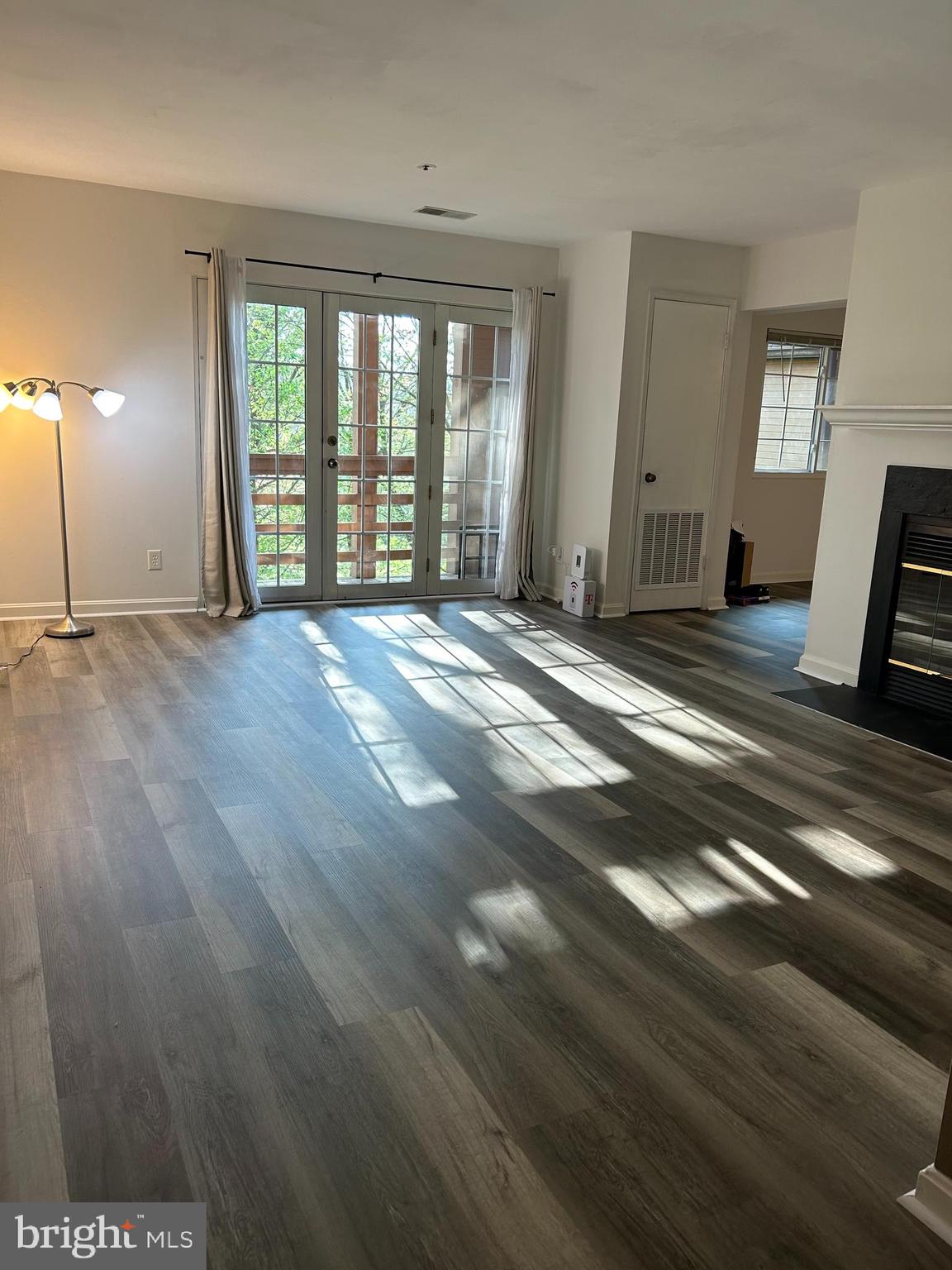 4922 Columbia Road, Unit 7 91 Columbia, MD 21044 - Photo 2 of 19 Living Room view from front door/foyer