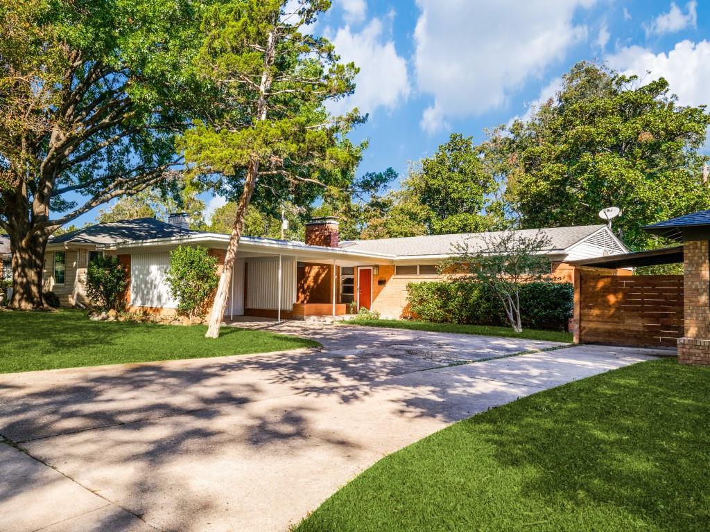 6721 Vada Drive Dallas, TX 75214 - Photo 1 of 1 a view of a yard in front of a house with large tree
