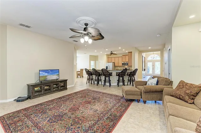 a spacious bathroom with a granite countertop sink a mirror and a