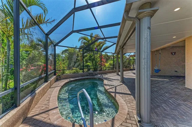 a view of swimming pool from a balcony