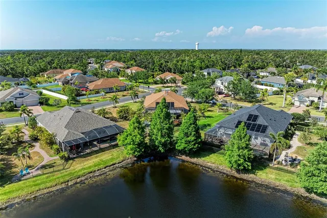 a view of a street with a cars parked side of road