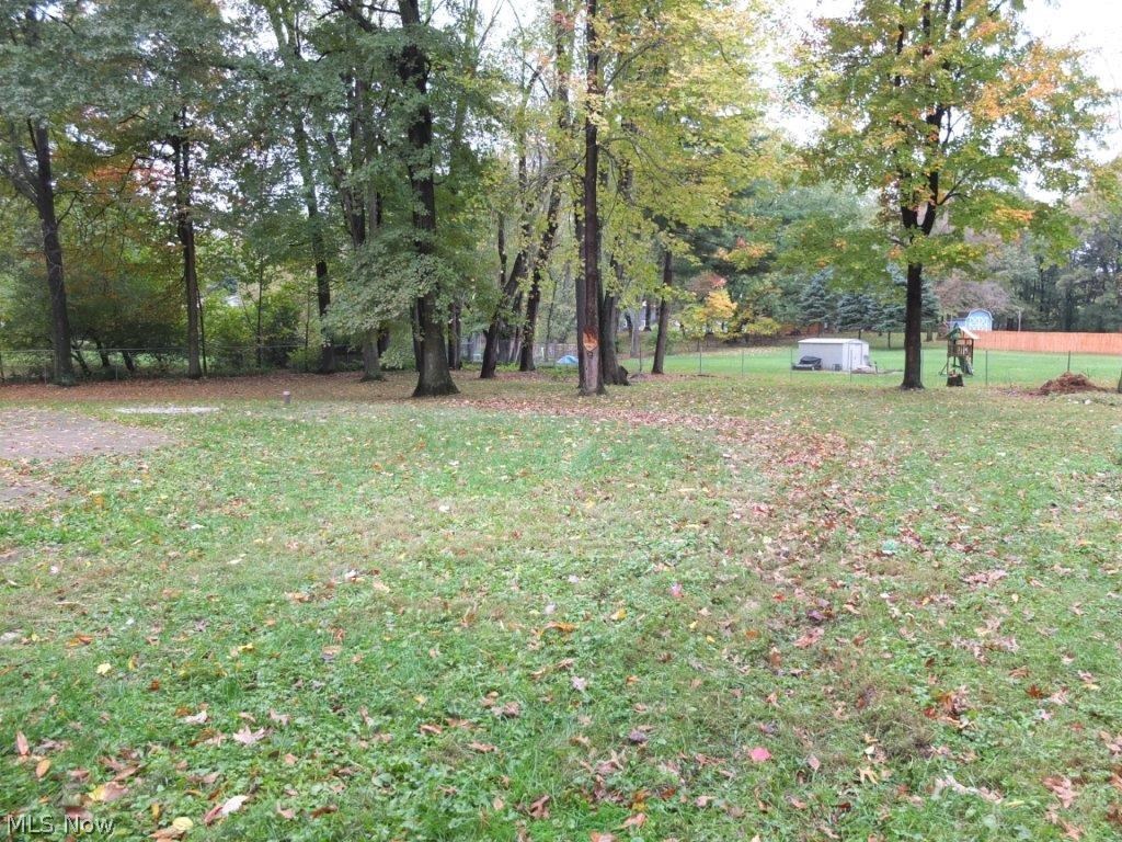 4262 Springdale Road Uniontown, OH 44685 - Photo 18 of 20 Fenced-in backyard.