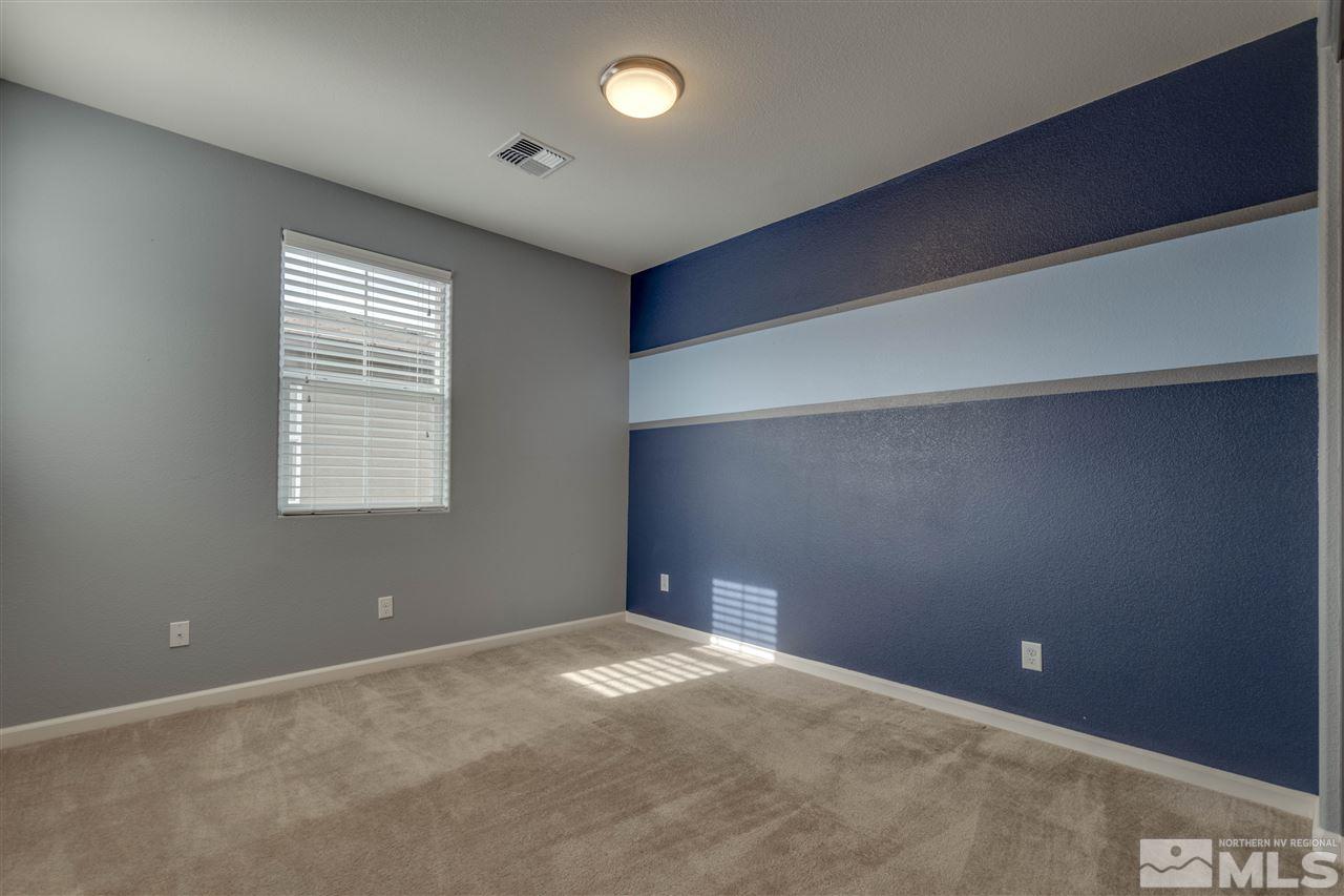 2815 Bonfire Lane Reno, NV 89521 - Photo 17 of 22 an empty room with windows
