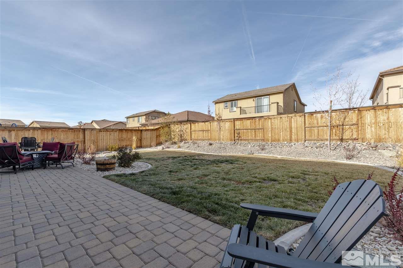 2815 Bonfire Lane Reno, NV 89521 - Photo 21 of 22 a view of a house with backyard and sitting area