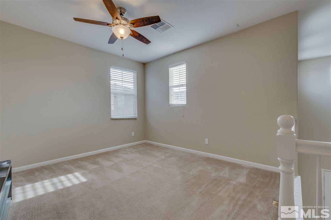2815 Bonfire Lane Reno, NV 89521 - Photo 8 of 22 a view of an empty room with a window