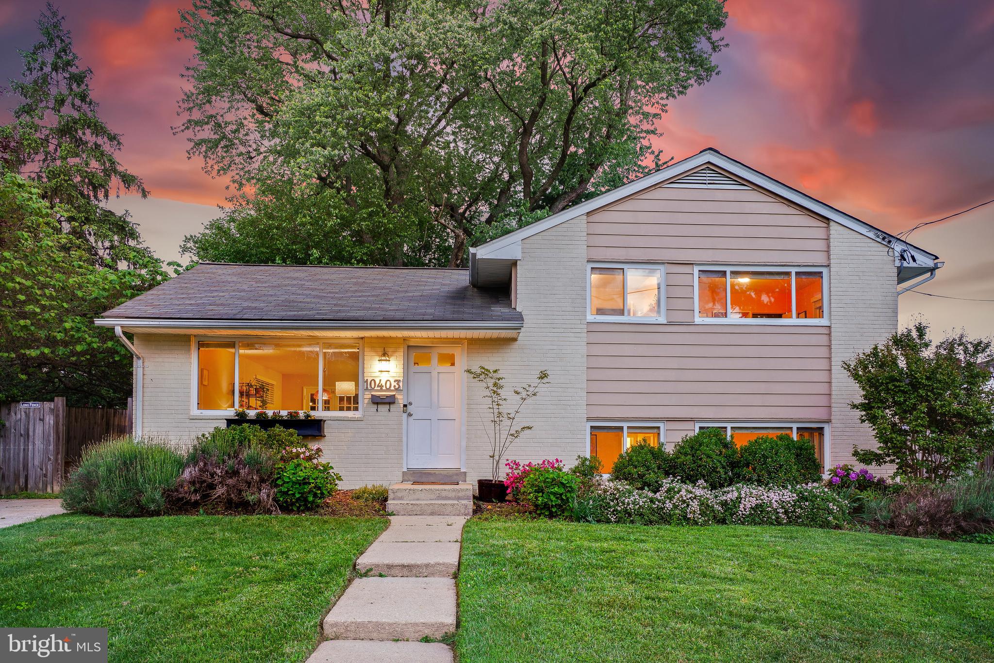10403 Conover Drive Silver Spring, MD 20902 - Photo 1 of 38 a front view of house with yard and green space