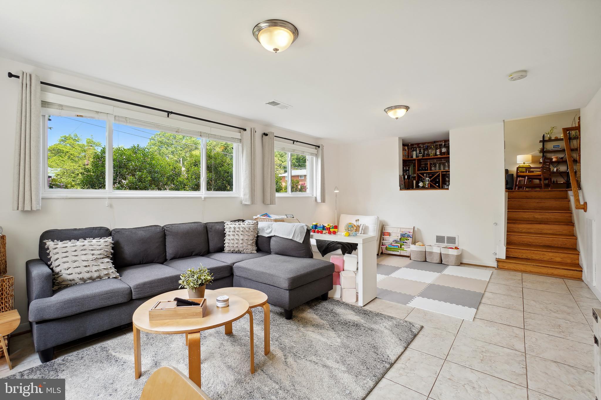 10403 Conover Drive Silver Spring, MD 20902 - Photo 26 of 38 a living room with furniture and a large window