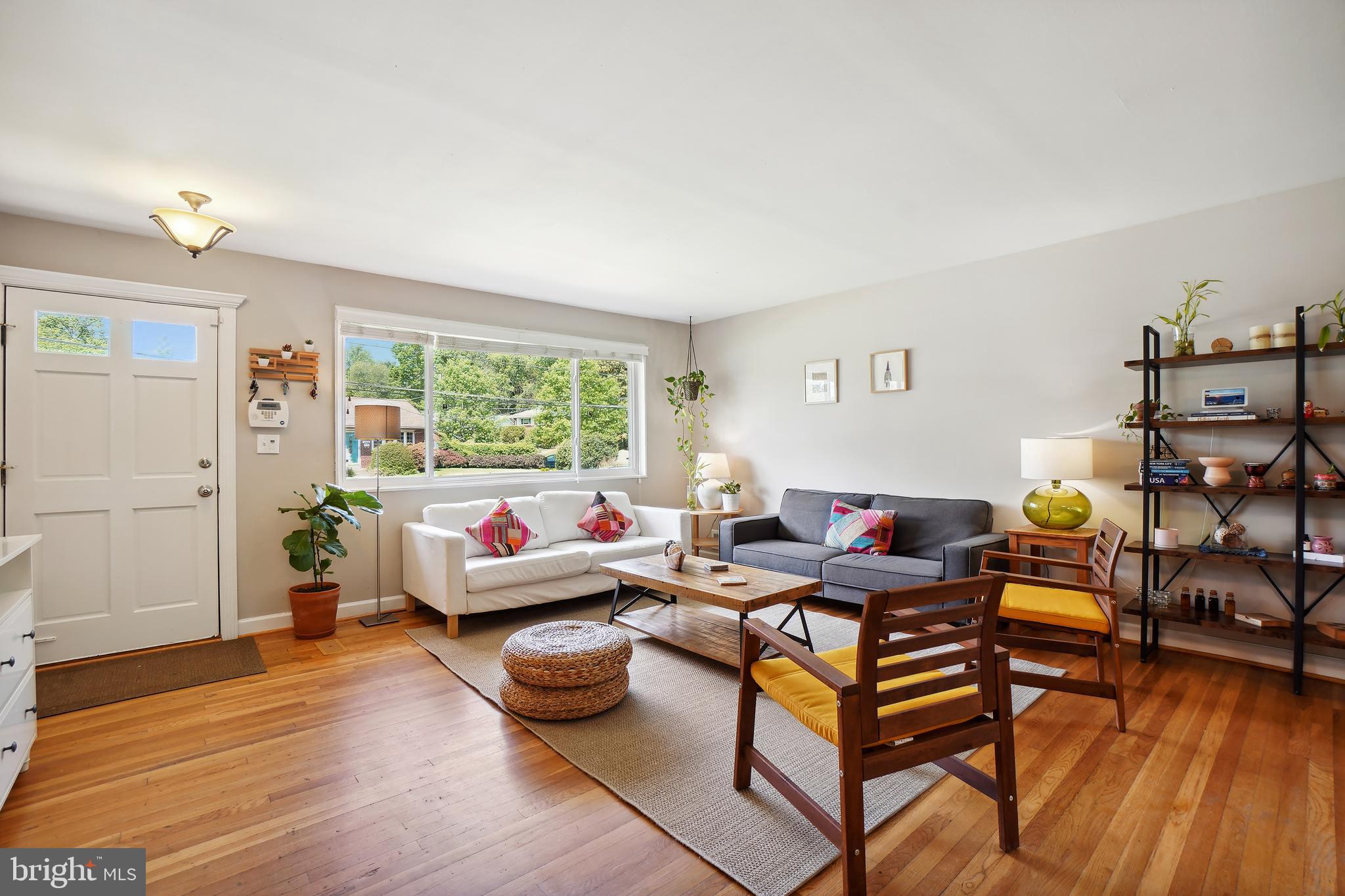 10403 Conover Drive Silver Spring, MD 20902 - Photo 3 of 38 a living room with furniture and wooden floor
