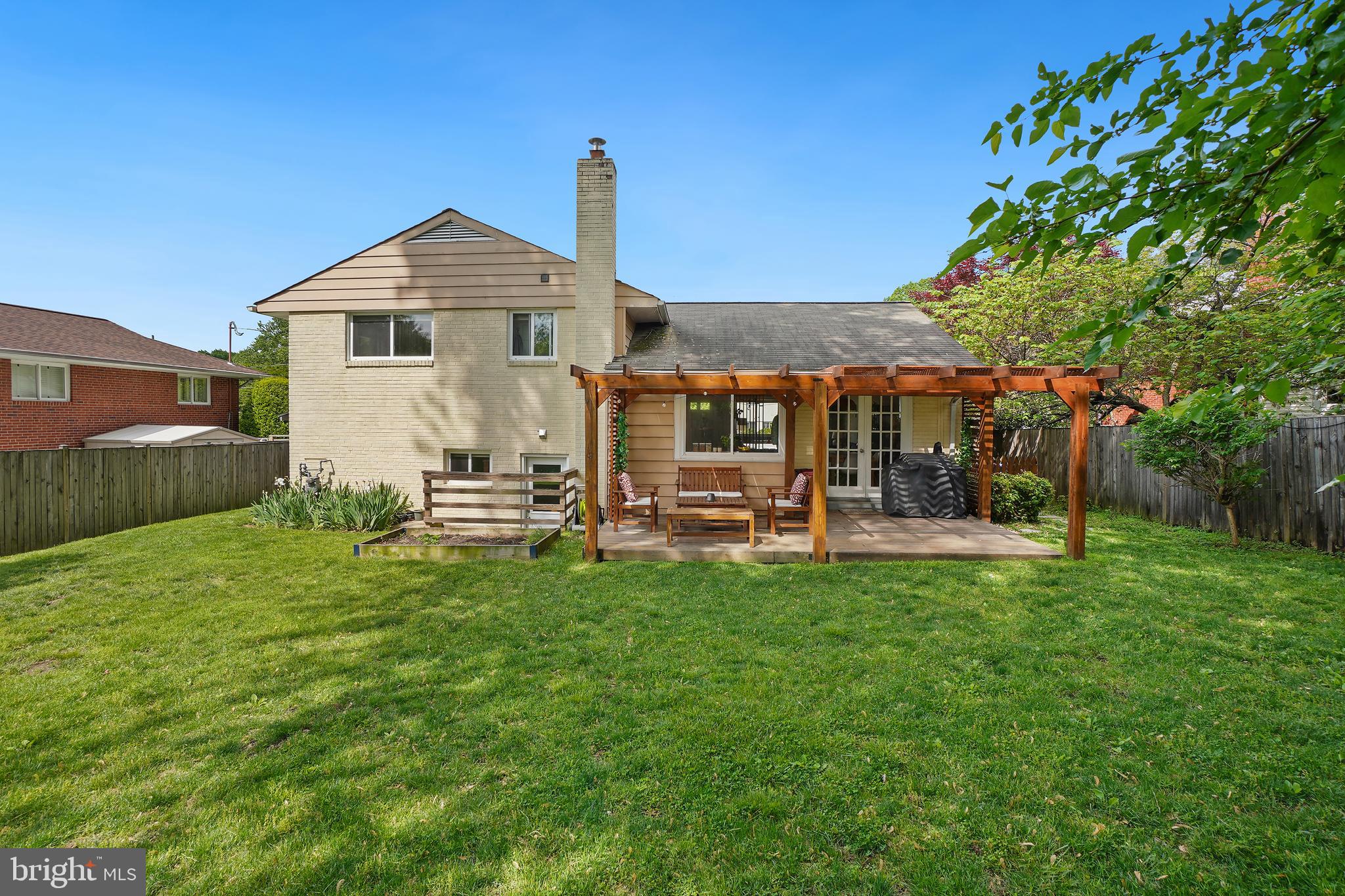 10403 Conover Drive Silver Spring, MD 20902 - Photo 35 of 38 a view of a house with backyard and porch